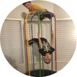 Two children playing with a Jungle Jumparoo - customer review image